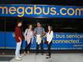 Customers outside of a megabus